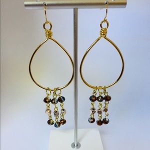 Gold plated hoops with beaded dangle on ear wires.
